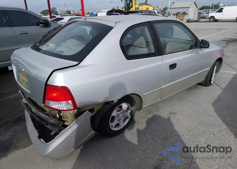 2000 Hyundai Accent Gs z USA, uszkodzony, nr VIN KMHCG35G8YU063783